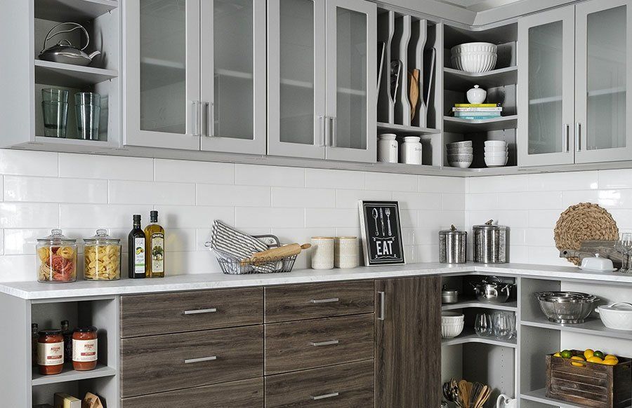 https://www.creativeclosetorganizers.com/wp-content/uploads/2022/05/custom-designed-installed-kitchen-pantry-cabinet-system-1920w.jpg